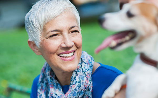 Woman smiling with dog